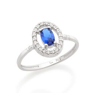 Rhodium plated oval ring with dark blue zirconia
